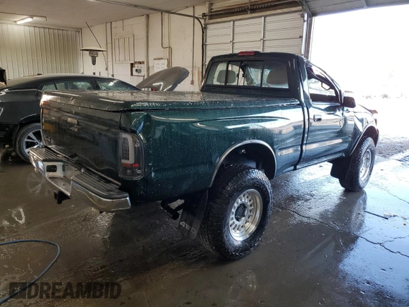 1999 Toyota Tacoma with VIN 4TAPM62N9XZ555738, listed as a Copart auction lot 78293634 with 210,096 mi miles and Salvage Title. Bid and sale history available at DreamBid. Image 3.