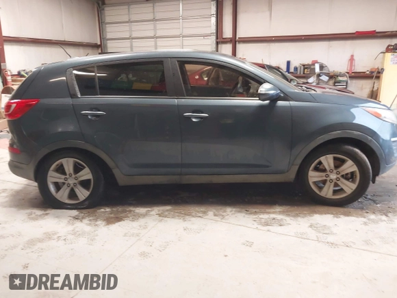 2013 Kia Sportage LX with VIN KNDPB3A2XD7446504, listed as a IAAI auction lot 41271313 with 94,646 mi miles and . Bid and sale history available at DreamBid. Image 13.