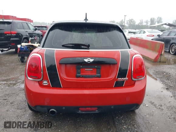2017 MINI Hardtop 4 Door Cooper with VIN WMWXU1C58H2E18094, listed as a IAAI auction lot 42312473 with 50,482 mi miles and . Bid and sale history available at DreamBid. Image 17.