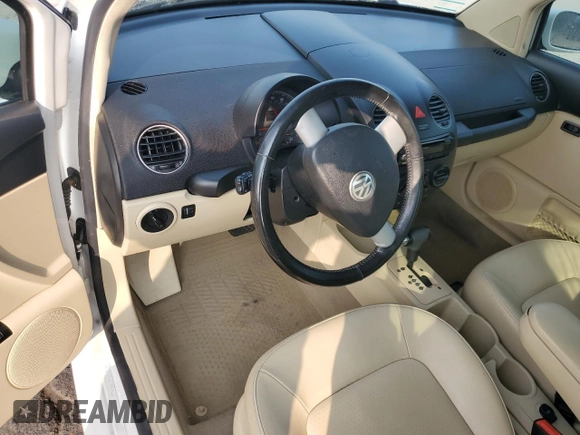 2010 Volkswagen Beetle with VIN 3VWPW3AG0AM027009, listed as a Copart auction lot 60617775 with 113,078 mi miles and Salvage title. Bid and sale history available at DreamBid. Image 8.