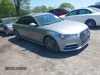 2016 Audi A6 Premium Plus with VIN WAUFGAFC6GN004786, listed as a IAAI auction lot 42070586 with 102,915 mi miles and . Bid and sale history available at DreamBid. Image 1.