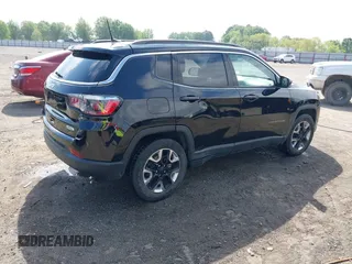 2021 Jeep Compass Altitude with VIN 3C4NJCBB0MT502423, listed as a IAAI auction lot 42006742 with 63,418 mi miles. Bid and sale history available at carsss.com. Image 4.