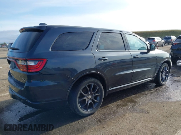 2015 Dodge Durango R/T with VIN 1C4SDJCT1FC188401, listed as a IAAI auction lot 42124652 with 86,339 mi miles and . Bid and sale history available at carsss.com. Image 4.