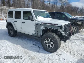 2021 Jeep Wrangler Unlimited Rubicon with VIN 1C4HJXFG9MW702608, listed as a Copart auction lot 45745475 with 51,345 mi miles and Salvage Title. Bid and sale history available at carsss.com. Image 4.