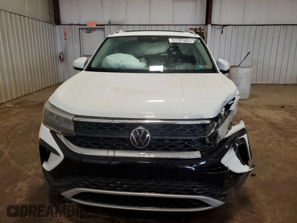 2023 Volkswagen Taos SE z VIN 3VVNX7B27PM309157, wystawiony jako Copart lot #51781625 z przebiegiem 23 355 mil mil oraz Szkoda całkowita • Salvage title. Historia ofert i sprzedaży dostępna na DreamBid. Obrazek 5.