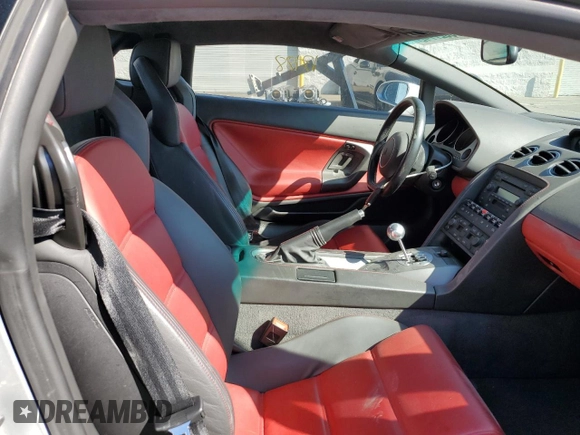 2004 Lamborghini Gallardo z VIN ZHWGU11M94LA01754, wystawiony jako Copart lot #67935984 z przebiegiem 17 188 mil mil oraz Szkody całkowita. Historia ofert i sprzedaży dostępna na DreamBid. Obrazek 5.