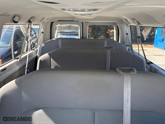2014 Ford Econoline Wagon XL with VIN 1FBNE3BL1EDA64827, listed as a Copart auction lot 48927855 with 102,965 mi miles and Clean Title. Bid and sale history available at carsss.com. Image 9.