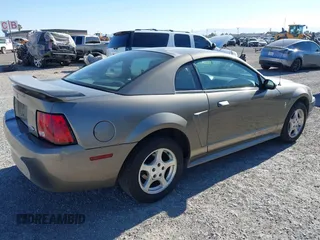 2002 Ford Mustang Standard with VIN 1FAFP40492F141347, listed as a IAAI auction lot 42721623 with 142,313 mi miles and . Bid and sale history available at DreamBid. Image 4.