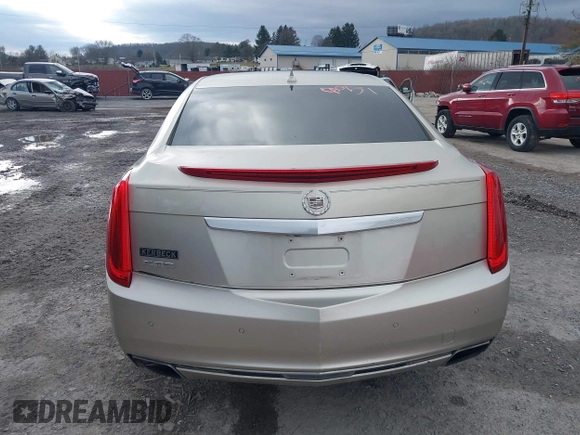 2014 Cadillac XTS Luxury z VIN 2G61M5S37E9304598, wystawiony jako IAAI lot #41006051 z przebiegiem 115 879 mil mil oraz . Historia ofert i sprzedaży dostępna na DreamBid. Obrazek 17.