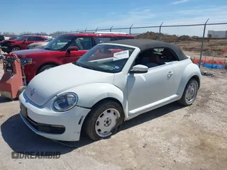 2015 Volkswagen Beetle 1.8T w/Tech with VIN 3VW517AT9FM810122, listed as a IAAI auction lot 41815980 with 72,420 mi miles and . Bid and sale history available at DreamBid. Image 17.