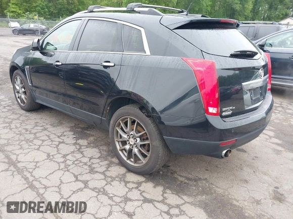 2013 Cadillac SRX Performance Collection z VIN 3GYFNHE39DS642111, wystawiony jako IAAI lot #42470291 z przebiegiem 176 239 mil mil oraz . Historia ofert i sprzedaży dostępna na DreamBid. Obrazek 3.