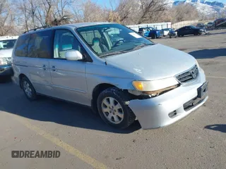 2004 Honda Odyssey EX z VIN 5FNRL186X4B061960, wystawiony jako IAAI lot #41384578 z przebiegiem 262 866 mil mil oraz . Historia ofert i sprzedaży dostępna na DreamBid. Obrazek 1.