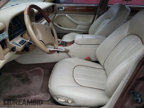 1995 Jaguar XJ with VIN SAJKX1742SC746763, listed as a Copart auction lot 84949964 with Not Provided miles and Clean Title. Bid and sale history available at DreamBid. Image 7.