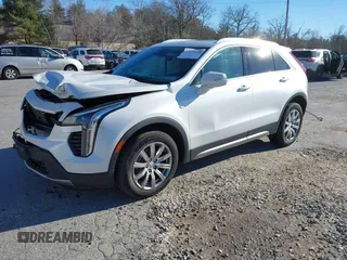 2022 Cadillac XT4 AWD Premium Luxury with VIN 1GYFZDR41NF105299, listed as a IAAI auction lot 41257154 with 34,904 mi miles and . Bid and sale history available at carsss.com. Image 2.