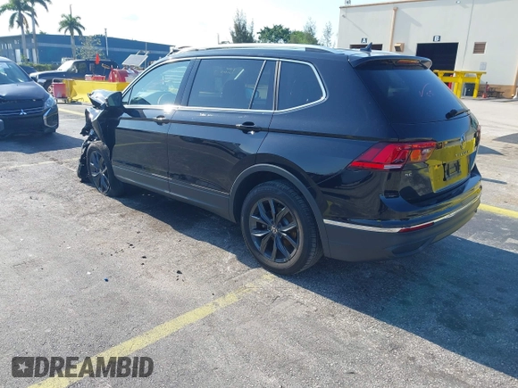 2024 Volkswagen Tiguan SE with VIN 3VVNB7AXXRM199400, listed as a IAAI auction lot 42216941 with 11,581 mi miles and . Bid and sale history available at DreamBid. Image 3.