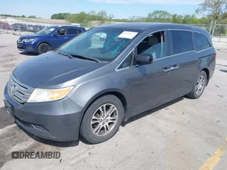 2011 Honda Odyssey EX-L with VIN 5FNRL5H69BB092752, listed as a IAAI auction lot 42245534 with 142,718 mi miles and . Bid and sale history available at DreamBid. Image 2.