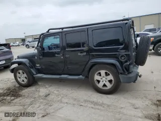 2011 Jeep Wrangler Unlimited Sahara with VIN 1J4HA5H13BL546703, listed as a Copart auction lot 51521845 with 127,132 mi miles and Salvage Title. Bid and sale history available at carsss.com. Image 2.