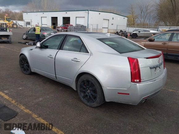 2009 Cadillac CTS AWD z VIN 1G6DH577X90135559, wystawiony jako IAAI lot #42077850 z przebiegiem 175 345 mil mil oraz . Historia ofert i sprzedaży dostępna na DreamBid. Obrazek 3.