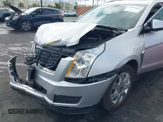 2016 Cadillac SRX Luxury Collection z VIN 3GYFNBE38GS520891, wystawiony jako IAAI lot #41781445 z przebiegiem 52 202 mil mil oraz . Historia ofert i sprzedaży dostępna na DreamBid. Obrazek 12.