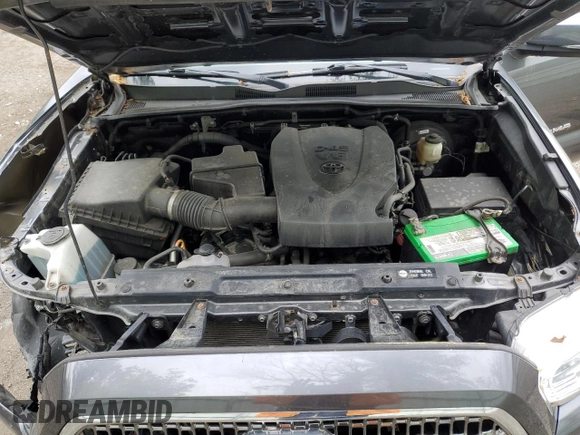 2017 Toyota Tacoma SR5 z VIN 3TMDZ5BN6HM017990, wystawiony jako Copart lot #57982205 z przebiegiem 51 890 mil mil oraz Szkoda całkowita • Salvage title. Historia ofert i sprzedaży dostępna na DreamBid. Obrazek 11.