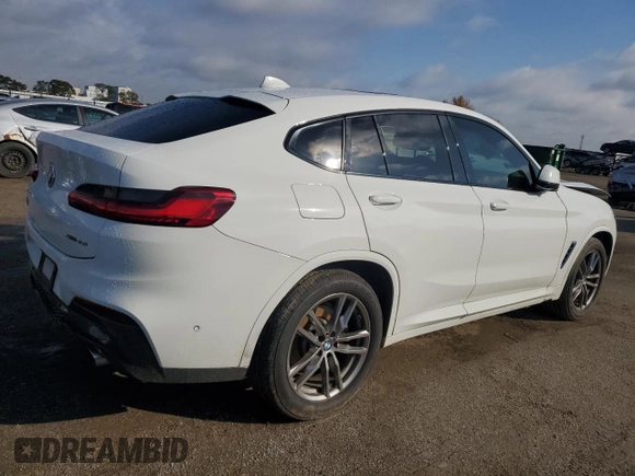 2019 BMW X4 xDrive30i with VIN 5UXUJ3C5XKLG54286, listed as a Copart auction lot 77333284 with 99,771 mi miles and Salvage Title. Bid and sale history available at carsss.com. Image 3.