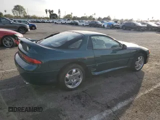 1997 Mitsubishi 3000GT GT z VIN JA3AM84J1VY004382, wystawiony jako Copart lot #45949465 z przebiegiem 166 552 mil mil oraz Czysty tytuł • Clean title. Historia ofert i sprzedaży dostępna na DreamBid. Obrazek 3.