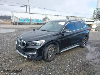 2021 BMW X1 xDrive28i with VIN WBXJG9C03M5S33561, listed as a IAAI auction lot 41541581 with NaN miles. Bid and sale history available at carsss.com. Image 17.