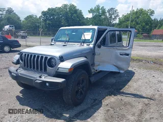 2021 Jeep Wrangler Unlimited Sahara with VIN 1C4HJXEN3MW628845, listed as a IAAI auction lot 42438049 with 49,970 mi miles and . Bid and sale history available at DreamBid. Image 2.