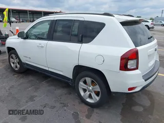 2016 Jeep Compass High Altitude Edition with VIN 1C4NJCEA7GD628257, listed as a IAAI auction lot 42102592 with 162,532 mi miles. Bid and sale history available at carsss.com. Image 3.