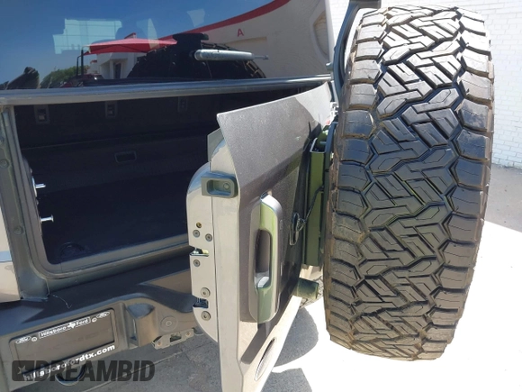 2023 Ford Bronco z VIN 1FMEE5DP8PLA91454, wystawiony jako IAAI lot #42805631 z przebiegiem 49 354 mil mil oraz . Historia ofert i sprzedaży dostępna na DreamBid. Obrazek 19.