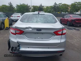 2016 Ford Fusion SE z VIN 3FA6P0H76GR385328, wystawiony jako IAAI lot #42408631 z przebiegiem 127 293 mil mil oraz . Historia ofert i sprzedaży dostępna na DreamBid. Obrazek 16.
