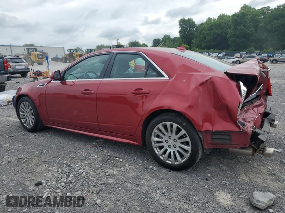 2013 Cadillac CTS Premium with VIN 1G6DS5E37D0103887, listed as a Copart auction lot 57390915 with 104,415 mi miles and Salvage title. Bid and sale history available at DreamBid. Image 2.