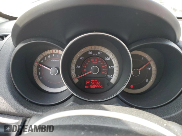 2010 Kia Forte EX z VIN KNAFU4A27A5260564, wystawiony jako Copart lot #55440345 z przebiegiem 169 444 mil mil oraz Szkoda całkowita • Salvage title. Historia ofert i sprzedaży dostępna na DreamBid. Obrazek 9.