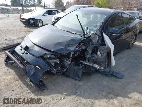 2020 Toyota Prius LE z VIN JTDKARFPXL3155639, wystawiony jako IAAI lot #41845001 z przebiegiem Nie podano mil oraz . Historia ofert i sprzedaży dostępna na DreamBid. Obrazek 6.
