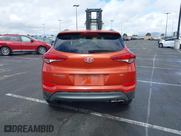 2016 Hyundai Tucson Sport with VIN KM8J33A20GU154428, listed as a IAAI auction lot 41722993 with 76,091 mi miles. Bid and sale history available at carsss.com. Image 17.
