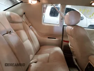 1999 Cadillac Eldorado z VIN 1G6EL12Y1XU611974, wystawiony jako Copart lot #71761494 z przebiegiem 139 494 mil mil oraz Czysty tytuł • Clean title. Historia ofert i sprzedaży dostępna na DreamBid. Obrazek 10.