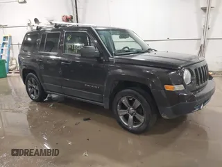 2014 Jeep Patriot Latitude z VIN 1C4NJPFA9ED717699, wystawiony jako IAAI lot #41699040 z przebiegiem 88 376 mil mil oraz . Historia ofert i sprzedaży dostępna na DreamBid. Obrazek 1.