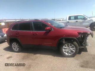 2016 Jeep Cherokee Latitude with VIN 1C4PJMCB9GW142189, listed as a IAAI auction lot 42010107 with 117,835 mi miles and . Bid and sale history available at DreamBid. Image 14.