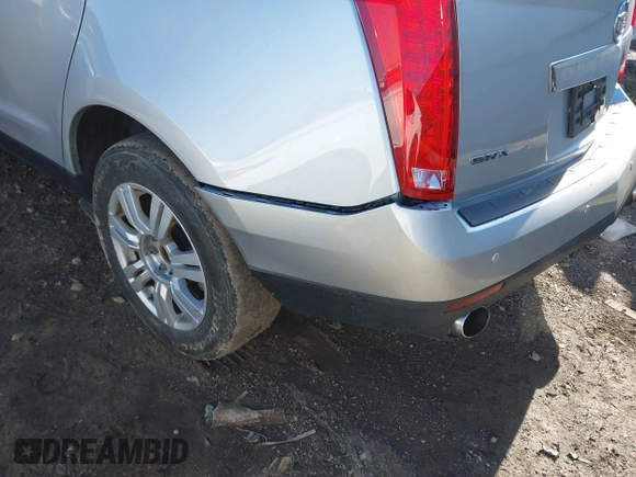 2015 Cadillac SRX with VIN 3GYFNAE39FS591106, listed as a IAAI auction lot 41539502 with 179,182 mi miles and . Bid and sale history available at DreamBid. Image 6.