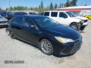 2015 Toyota Camry LE z VIN 4T1BD1FK4FU163453, wystawiony jako IAAI lot #42164483 z przebiegiem 138 527 mil mil oraz . Historia ofert i sprzedaży dostępna na DreamBid. Obrazek 1.