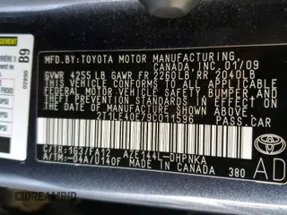 2009 Toyota Matrix S with VIN 2T1LE40E79C011596, listed as a Copart auction lot 60873695 with 207,692 mi miles and Salvage title. Bid and sale history available at DreamBid. Image 12.