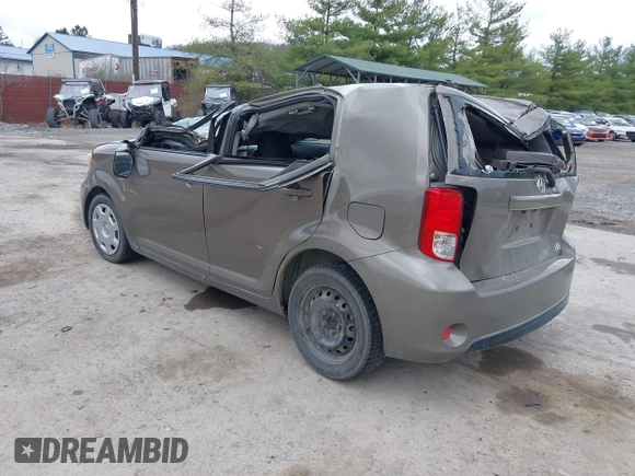 2014 Scion xB with VIN JTLZE4FE9EJ050596, listed as a IAAI auction lot 41884572 with 141,896 mi miles. Bid and sale history available at carsss.com. Image 3.