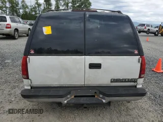 1999 Chevrolet Tahoe Z71 with VIN 1GNEK13R1XJ365475, listed as a Copart auction lot 56258175 with 184,647 mi miles and Clean Title. Bid and sale history available at DreamBid. Image 6.