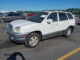 2003 Hyundai Santa Fe GLS z VIN KM8SC13D33U463702, wystawiony jako IAAI lot #42302300 z przebiegiem 226 340 mil mil oraz . Historia ofert i sprzedaży dostępna na DreamBid. Obrazek 2.
