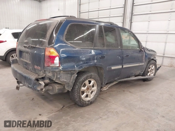 2002 GMC Envoy SLT with VIN 1GKDT13S022388743, listed as a IAAI auction lot 41338364 with 206,179 mi miles. Bid and sale history available at carsss.com. Image 4.
