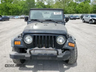 2004 Jeep Wrangler SE with VIN 1J4FA29124P796031, listed as a Copart auction lot 56875525 with 239,488 mi miles and Clean title. Bid and sale history available at DreamBid. Image 5.