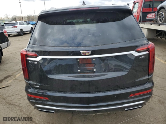 2021 Cadillac XT6 Premium Luxury with VIN 1GYKPDRSXMZ179742, listed as a Copart auction lot 79511814 with 33,895 mi miles and Salvage Title. Bid and sale history available at carsss.com. Image 6.