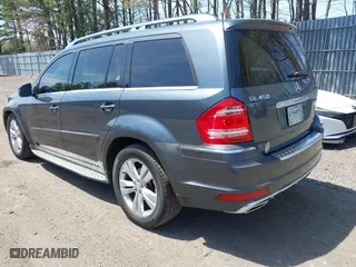 2011 Mercedes-Benz GL-Class GL 450 with VIN 4JGBF7BE9BA662497, listed as a IAAI auction lot 42102696 with 90,924 mi miles. Bid and sale history available at carsss.com. Image 3.