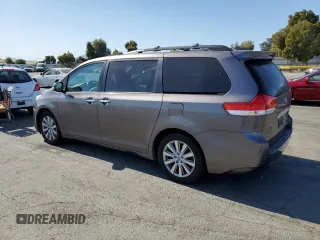 2014 Toyota Sienna Limited with VIN 5TDDK3DC0ES081720, listed as a Copart auction lot 63143875 with 213,928 mi miles and Clean title. Bid and sale history available at DreamBid. Image 2.