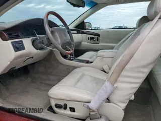 2001 Cadillac Eldorado ESC z VIN 1G6EL12Y11B103541, wystawiony jako Copart lot #45219055 z przebiegiem 46 179 mil mil oraz Tytuł czysty. Historia ofert i sprzedaży dostępna na DreamBid. Obrazek 7.